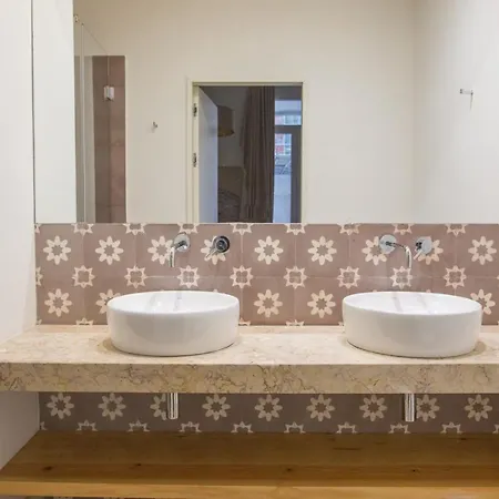Plum Guide - The Sunny Rhino Apartment Lisbon